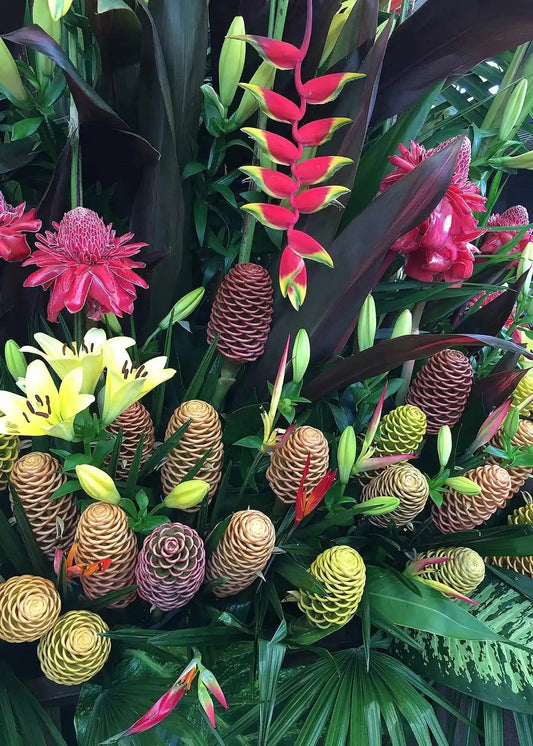 Vibrant floral puzzle featuring assorted gingers and heliconias in green and pink hues, promoting serenity and relaxation.